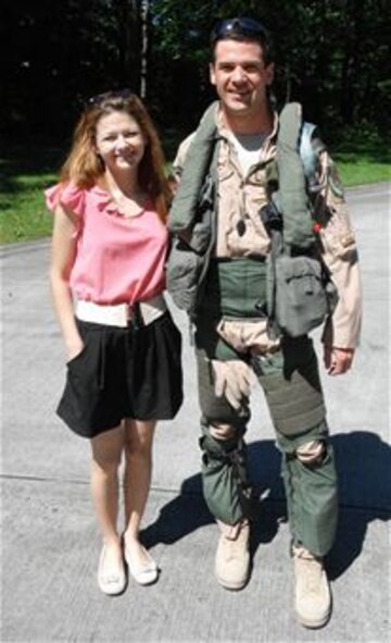 Maj. Dan McGuire, an F-16 exchange pilot who was assigned to the 312th Tactical Fighter Squadron at Volkel Air Base in the Netherlands, and his wife, Jen, reunite on May 25, 2012, following McGuire's four-month deployment to Afghanistan. McGuire deployed to Mazar-e-Sharif, Afghanistan, with the Dutch Air Task Force, a detachment of the Royal Netherlands Defense. McGuire participated in the Air Force Personnel Exchange Program and the couple lived in the Netherlands for two years. Prior to moving, both became fluent in Dutch through a six-month course offered by the Defense Language Institute in Alexandria, Va. In November, the McGuire's relocated to the Arizona Air National Guard's 162nd Fighter Wing in Tucson, Ariz. (courtesy photo)