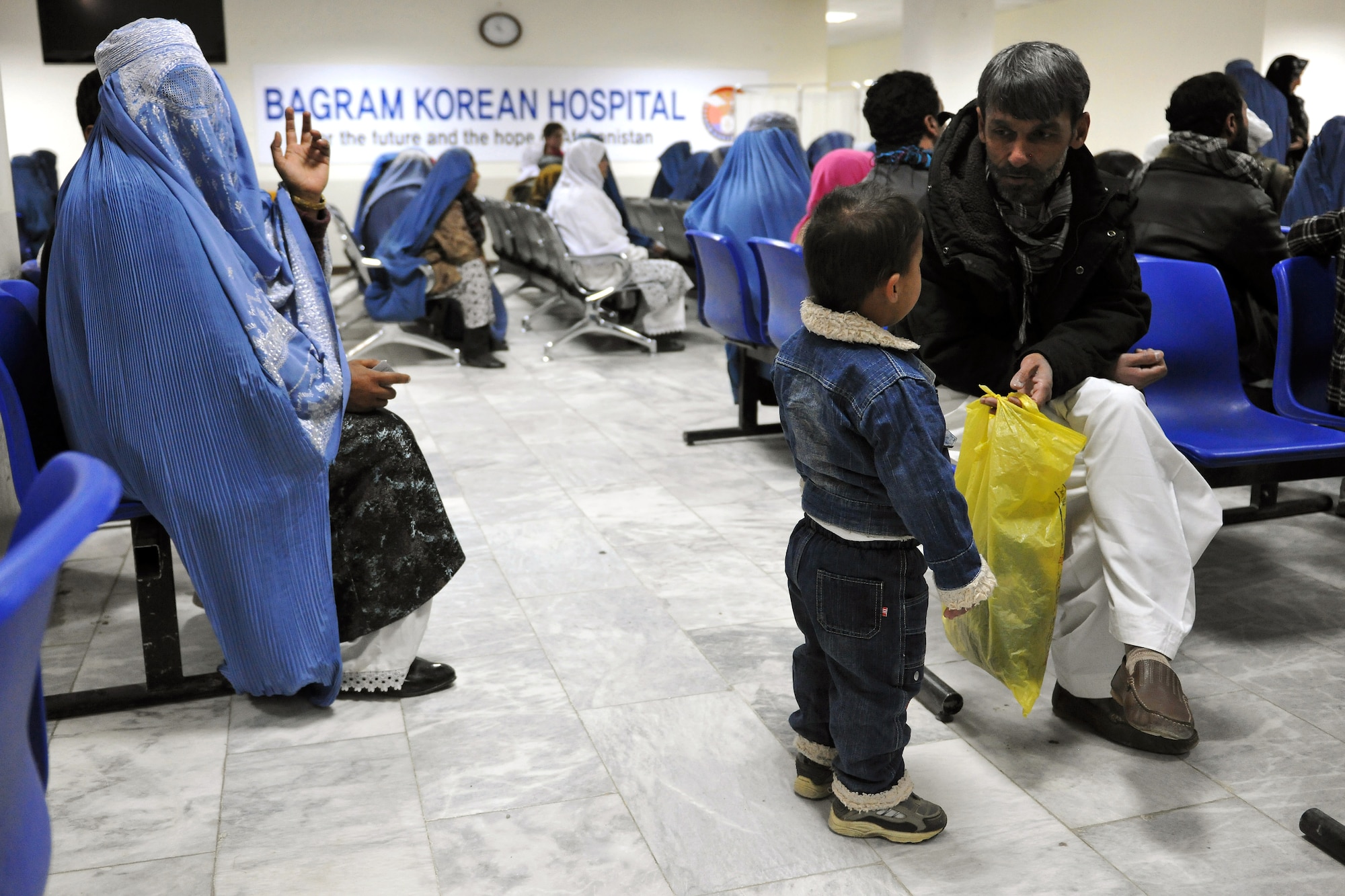 Local Afghans await medical care in the Korean Hospital at Bagram Airfield, Afghanistan, Dec. 2, 2012.  Medical teams use biometrics to identify and track the records for all incoming patients by scanning their iris and fingerprints and then inputting the information into a database.  (U.S. Air Force photo/Senior Airman Chris Willis)