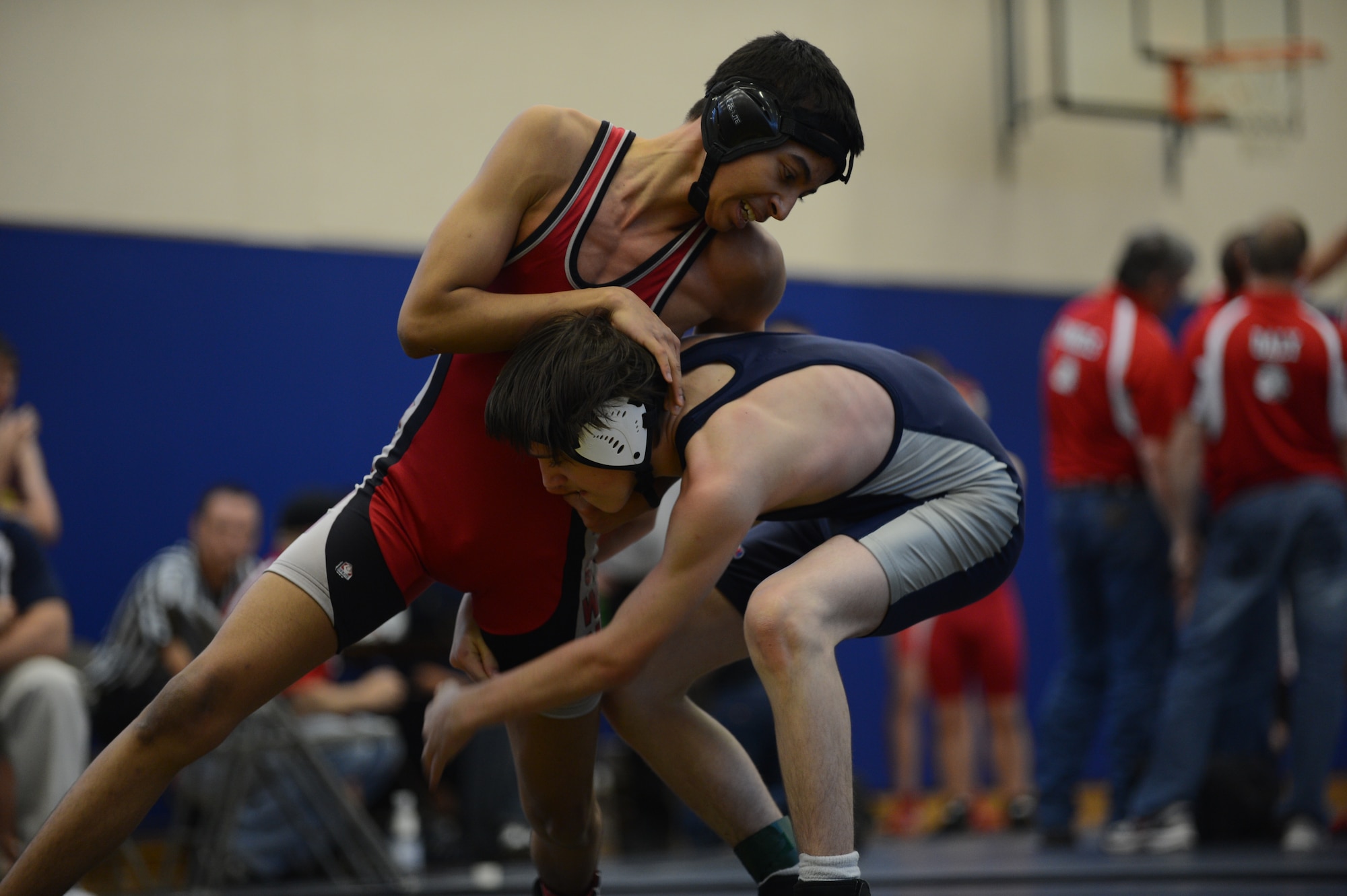 BITBURG ANNEX, Germany – Kaiserslautern Raider sophomore Victor Rodriguez, left, and Bitburg Baron freshman Robert Pomeroy face off in a wrestling match at Bitburg High School Dec. 1, 2012. Rodriguez won the 120 pound weight class bout by points rather than submission.  Pomeroy is one of 17 wrestlers on the Bitburg High School team which includes two girls and two members of Bitburg Middle School. (U.S. Air Force photo by Airman 1st Class Gustavo Castillo/Released)