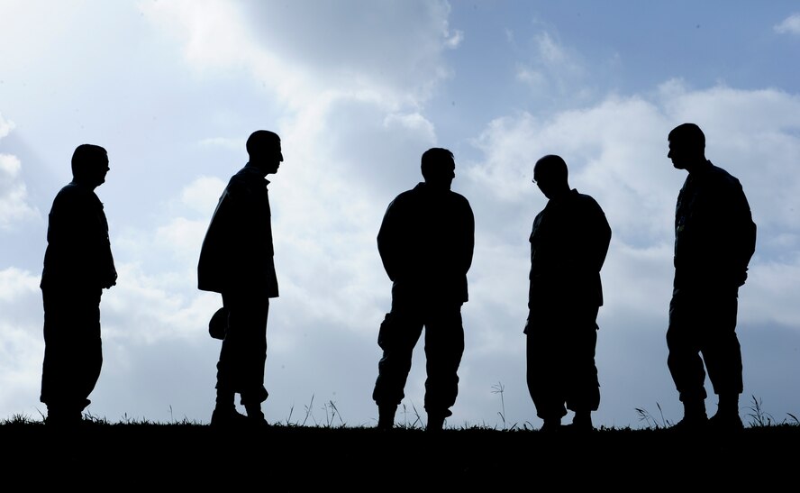 From left to right, U.S. Air Force Col. Brian McDaniel, 18th Wing vice commander, Lt. Col. Aaron Cowley, 18th Munitions Squadron commander, Lt. Gen. Stephen Mueller, Inspector General of the Air Force, talks with Master Sgt. Casey Stutzman, 18th Munitions Squadron NCOIC of munitions control and Staff Sgt. Joshua Roundtree, 18th Munitions Squadron munitions inspector, about the munitions area during his visit to Kadena Air Base, Japan, Dec. 4, 2012. Mueller visited Kadena to get a better understanding of Pacific Air Force's operations and address any issues and concerns of Airmen in the region. (U.S. Air Force photo/Airman 1st Class Justin Veazie)
