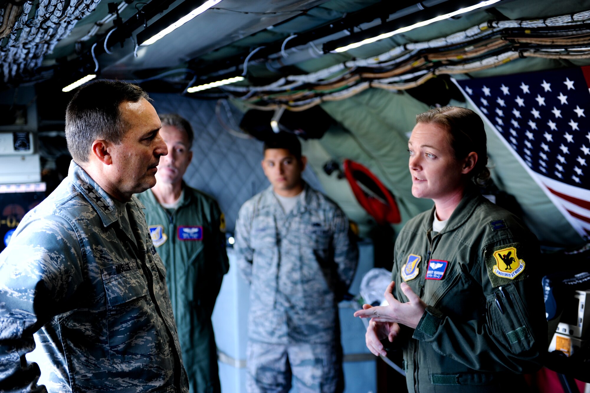 U.S. Air Force Lt. Gen. Stephen Mueller, Inspector General of the Air Force, listens to a briefing from Capt. Kimberley Vaughan, 18th Operations Group flight nurse, during his visit to Kadena Air Base, Japan, Dec. 4, 2012. Mueller visited Kadena during his Pacific Air Force Orientation tour. His direct interaction with Kadena Airmen generated discussion that he will take back to the Pentagon. (U.S. Air Force photo/Airman 1st Class Justin Veazie)

