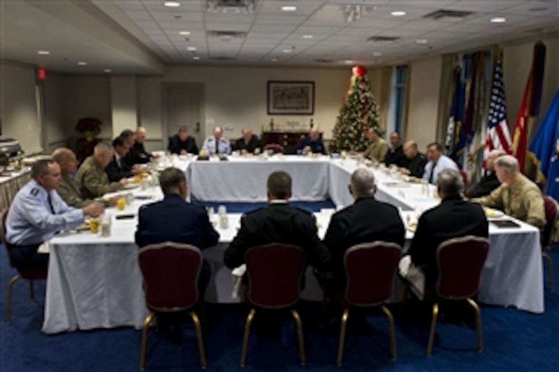 Defense Secretary Leon E. Panetta, right center, Deputy Defense Secretary Ashton B. Carter, left center, and Army Gen. Martin E. Dempsey, chairman of the Joint Chiefs of Staff, back center, meet with combatant commanders during a working breakfast at the Pentagon, Dec. 5, 2012.