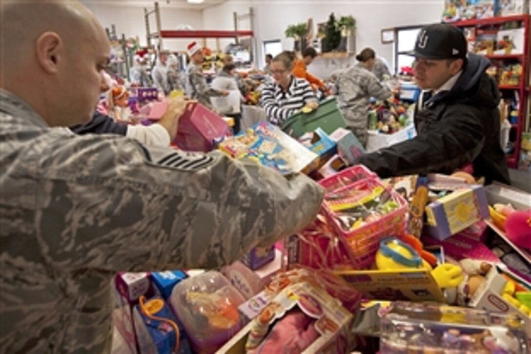 Air Force Airman’s Attic volunteers help parents find toys during the 9th annual toy distribution on Eglin Air Force Base, Fla. Nov. 29, 2012. More than 6,000 toys, collected by donations made throughout the year, were distributed to active-military families in need of assistance during the holidays.