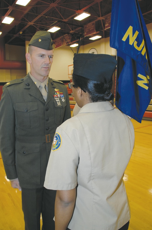 Maj. Mike Mullins, deputy manager, Center Operations Division, Maintenance Management Center, Marine Corps Logistics Command, serves as the guest inspector during Lee County High School Navy Junior Reserve Officers Training Corps’ annual inspection, Nov. 30.