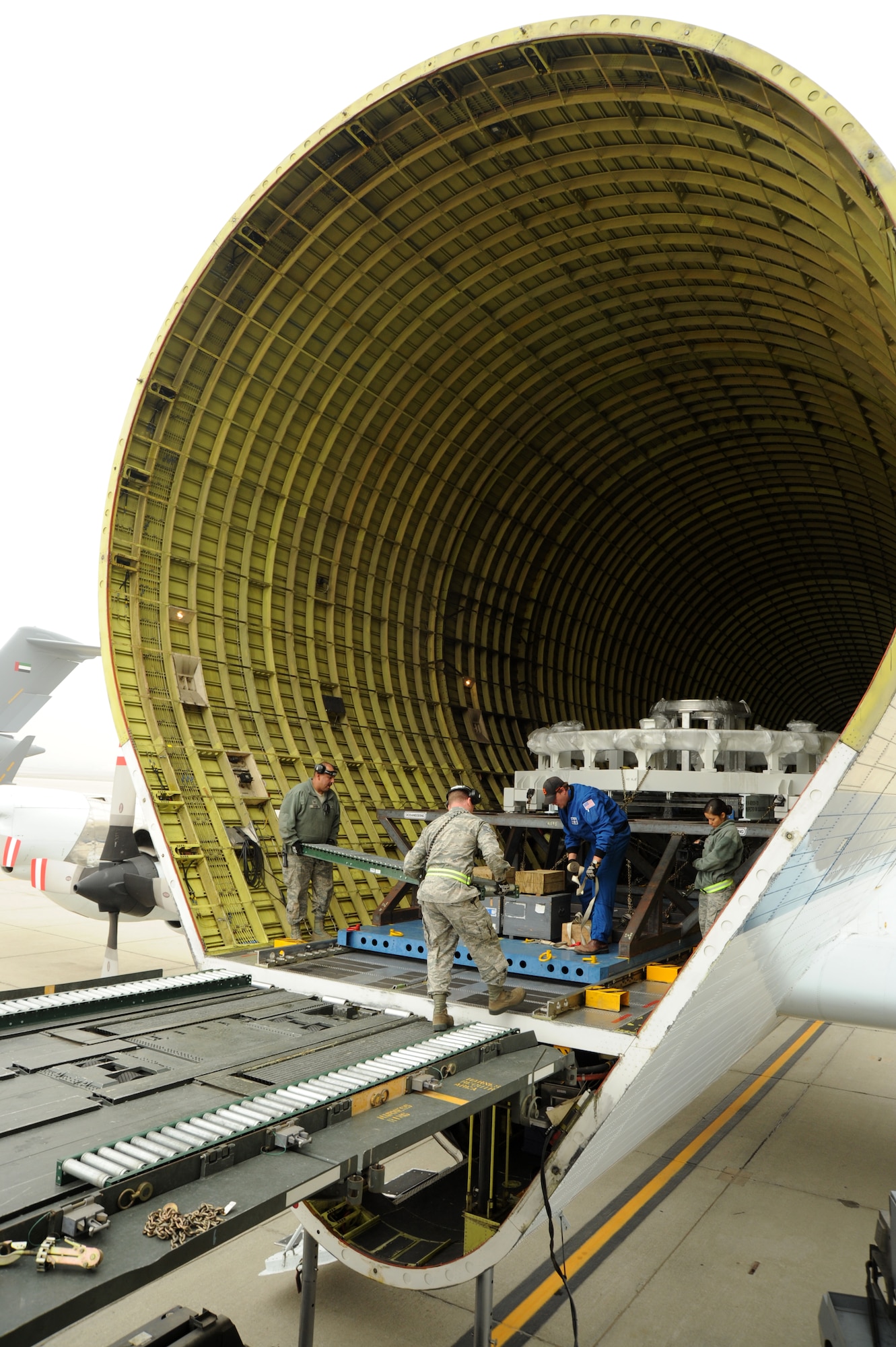 The National Aeronautics and Space Administration’s Super Guppy, shown parked on the March Air Reserve Base transit alert pad, Nov. 27, was tasked with transporting an enormous metal ring that will be used to test NASA’s Orion Multi-Purpose Crew Vehicle. The awkwardly shaped aircraft is specifically designed to carry oversized payloads and has been in service since August 1965. (U.S. Air Force photo by Tech. Sgt. Christine Jones)