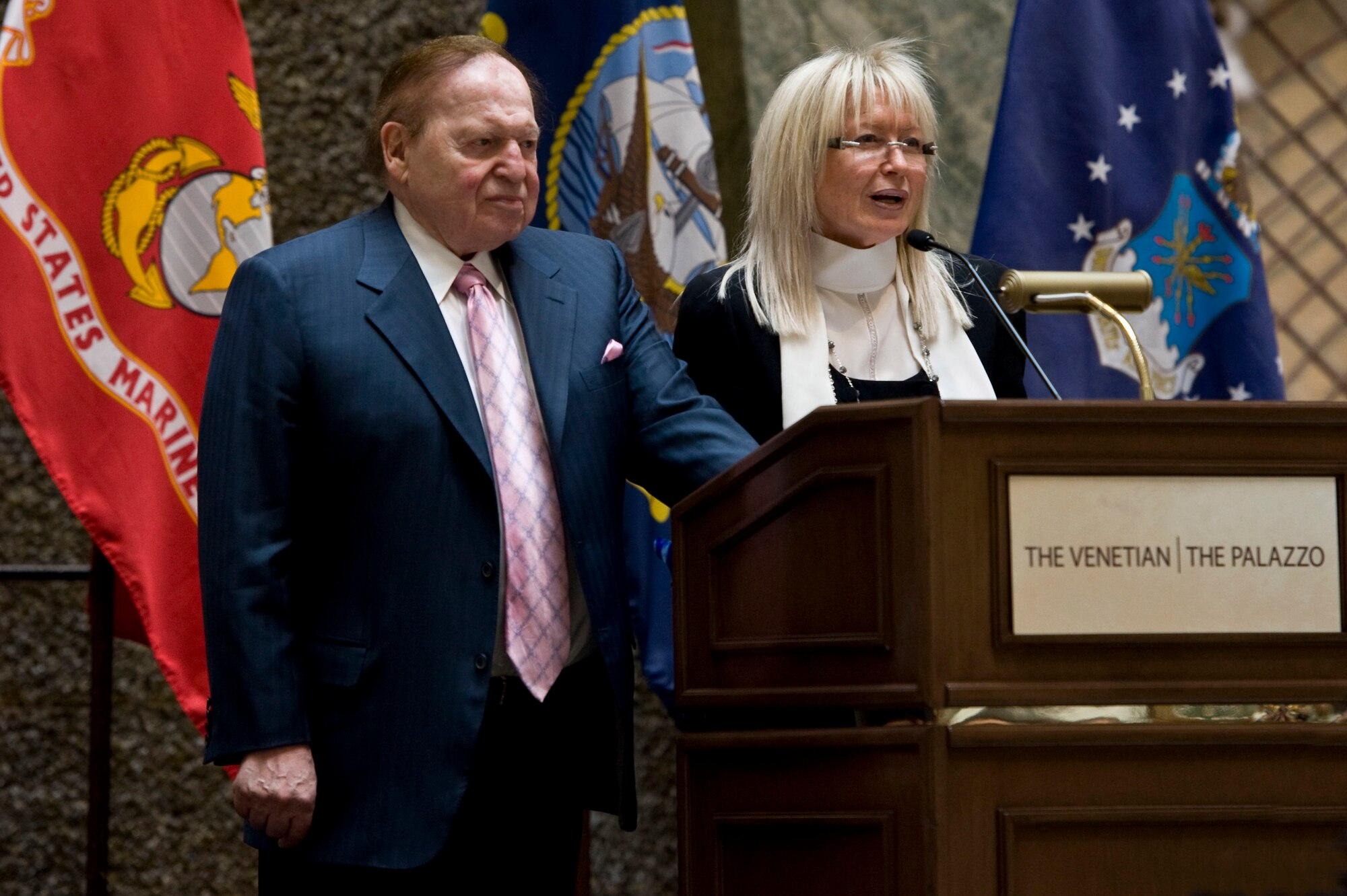 Sheldon Adelson, owner of the Palazzo Hotel, and his wife Miriam Ochsorn, thank wounded warriors for their service during a "Salute Our Troops" celebration Dec. 5, 2012, in Las Vegas. Over the past six years, the local casino has hosted more than 600 veterans and their guests as part of patriotic celebrations. (U.S. Air Force photo by Airman 1st Class Christopher Tam)