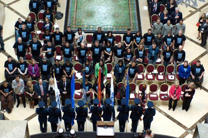The Nellis Air Force Base Honor Guard posts the colors during the "Salute Our Troops" opening ceremony Dec. 5, 2012, in Las Vegas.  The Honor Guard represents the Air Force at ceremonial functions to render military honors to service members and their families. (U.S. Air Force photo by Airman 1st Class Monet Villacorte)