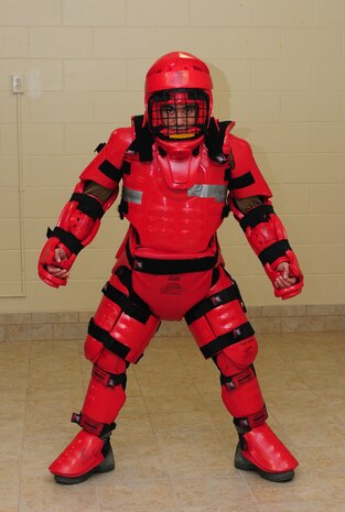 Senior Airman Joseph LeGrand, 9th Maintenance Operations Squadron data integrity team analyst, volunteers to play the attacker for a women's self-defense class at the Foothills Chapel at Beale Air Force Base, Calif., Dec. 6, 2012. The class taught women techniques to help prevent and evade attack situations. (U.S. Air Force photo by Senior Airman Allen Pollard/released)