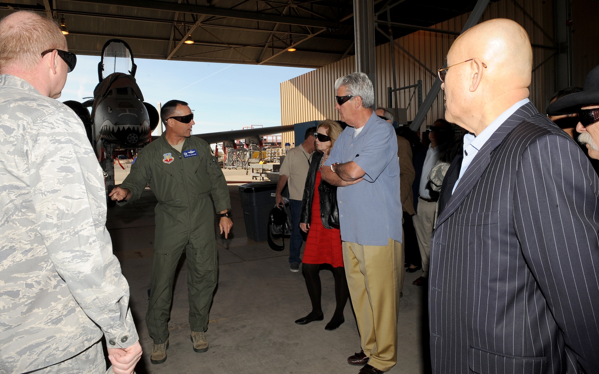 U.S. Air Force Col. Kevin Blanchard, 355th Fighter Wing commander, explains the upgrades that have been made to the A-10 Thunderbolt during the honorary commanders' tour of the 309th Aerospace Maintenance and Regeneration Group on Davis-Monthan Air Force Base, Ariz., Dec. 5, 2012. The HCC program holds quarterly events that are slated to cover the entirety of the major missions carried out day-to-day on D-M. (U.S. Air Force photo by Senior Airman Brittany Dowdle)