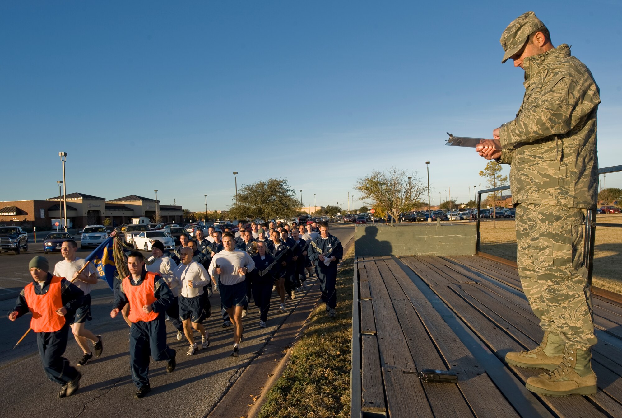Col. Vincent Lostetter, 7th Bomb Wing vice commander, judges a pass in review run during Resiliency Week Dec. 5, 2012, at Dyess Air Force Base, Texas. The week’s purpose was to strengthen understanding and application of resiliency through team-building activities. (U.S. Air Force photo by Airman 1st Class Jonathan Stefanko/ Released) 