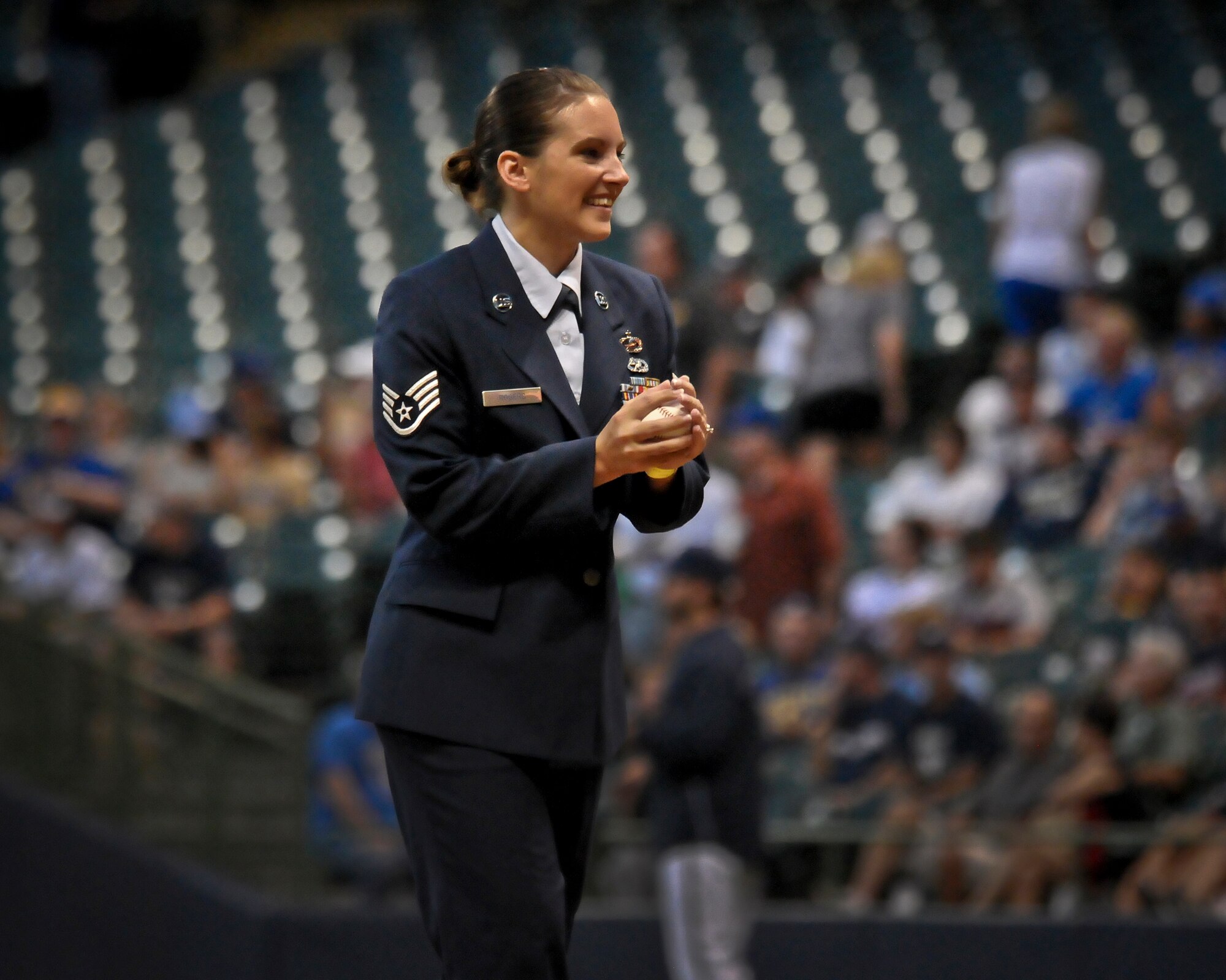 Staff Sgt. Leah Rogers readies herself to deliver the ceremonial first pitch at Miller Park in Milwaukee Wed., Sept. 12, 2012. 
Rogers, a Financial Management Specialist at the 128th Air Refueling Wing, recently returned home from an overseas deployment and was selected to represent her Air National Guard unit by throwing the ceremonial first pitch prior to the Brewers’ game against the Atlanta Braves. (Air National Guard Photo by 2nd Lt. Nathan Wallin / Released)
