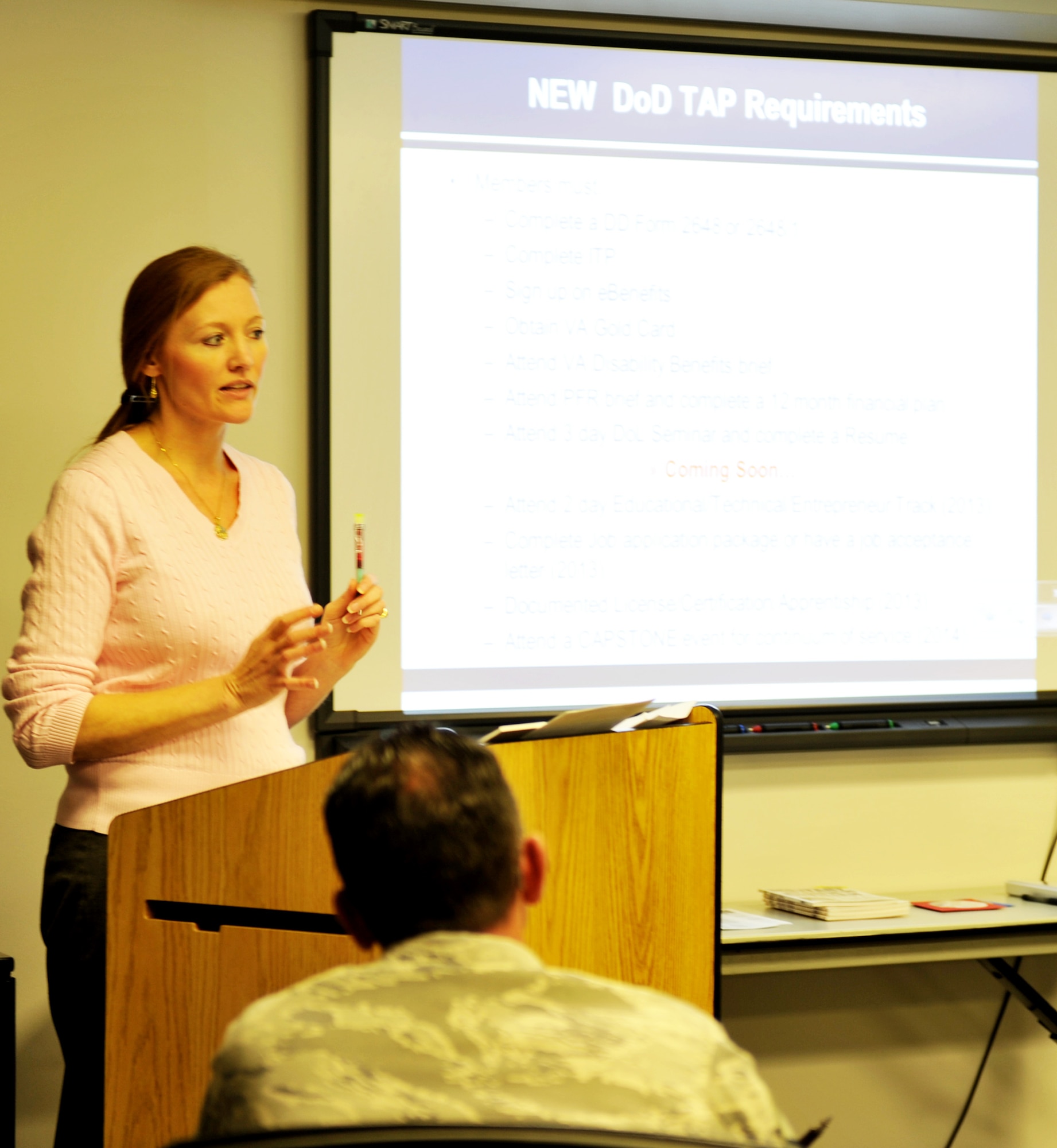 Joanne Rodriguez, Airmen and Family Readiness Center community readiness technician, briefs Airmen during a pre-separation and pre-retirement class Nov. 27 at Whiteman Air Force Base, Mo. The A&FRC offers a variety of services to help individuals deal with military life changes, including welcoming new children to the family, PCSing, transitioning out of the Air Force, crisis management and conflict resolution. (U.S. Air Force photo/Heidi Hunt)