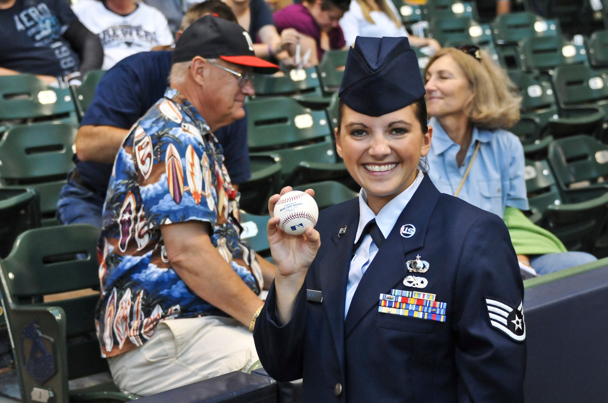 Staff Sgt. Leah Rogers of the 128th Air Refueling poses for a photograph moments before she threw out the ceremonial first pitch at Miller Park in Milwaukee Wed., Sept. 12, 2012.  
Rogers, who had recently returned from an overseas deployment, 
was selected to represent Wisconsin Air National Guard unit and throw out the ceremonial first pitch before the Brewers’ game against the Atlanta Braves 
(Air National Guard Photo by Staff Sgt. Jeremy M. Wilson / Released)
