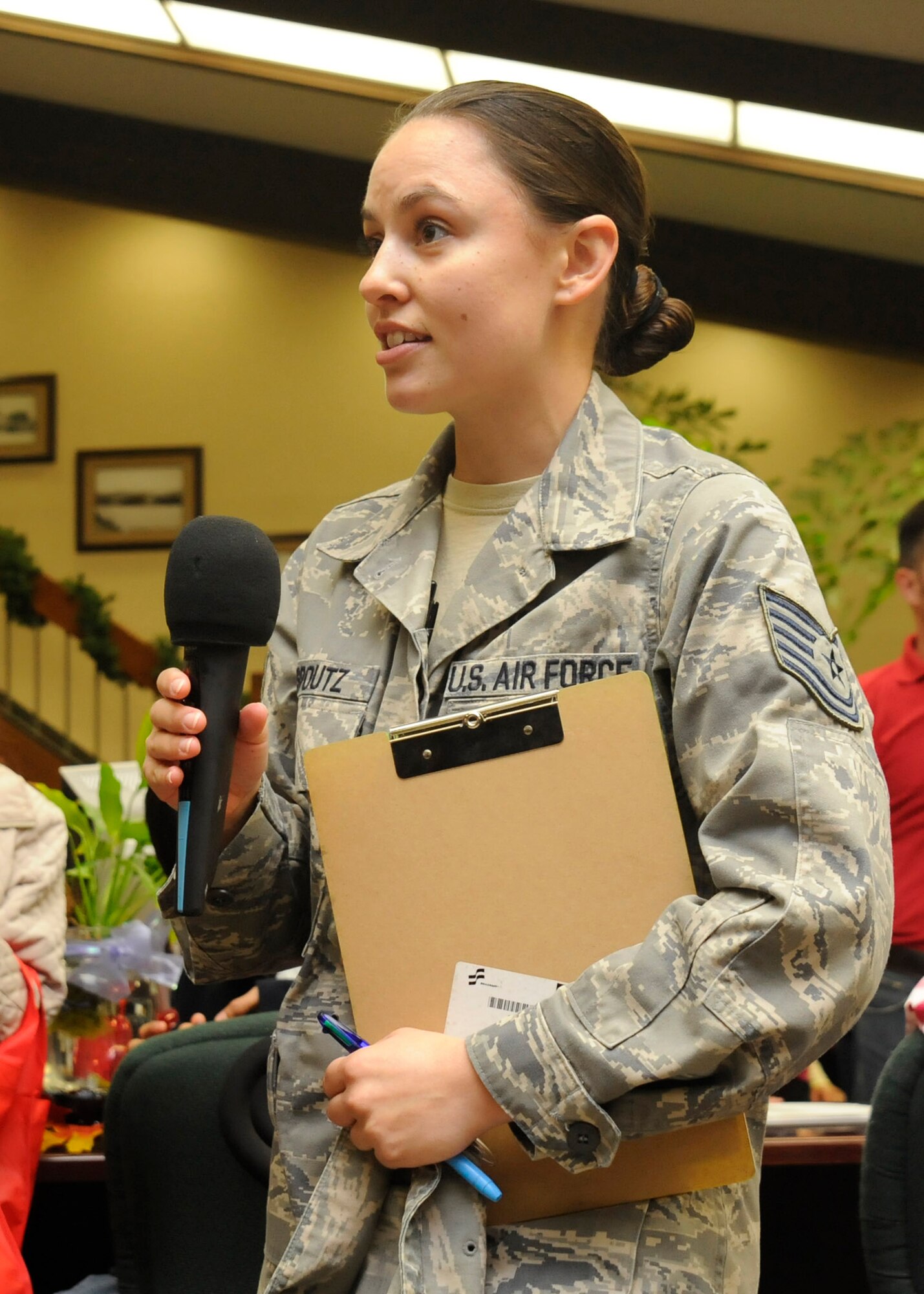 LOMPOC, Calif. – Tech. Sgt. Brittany Spoutz, Airman and Family Readiness Center readiness non-commissioned officer, thanks volunteers for their support of the 6th annual Trees for Troops event at Santa Barbara Bank and Trust’s Lompoc branch Wednesday evening, Dec. 5, 2012. Santa Barbara Bank and Trust donated 90 trees to deployed spouses and families in need assigned to the base. (U.S. Air Force photo/Michael Peterson)