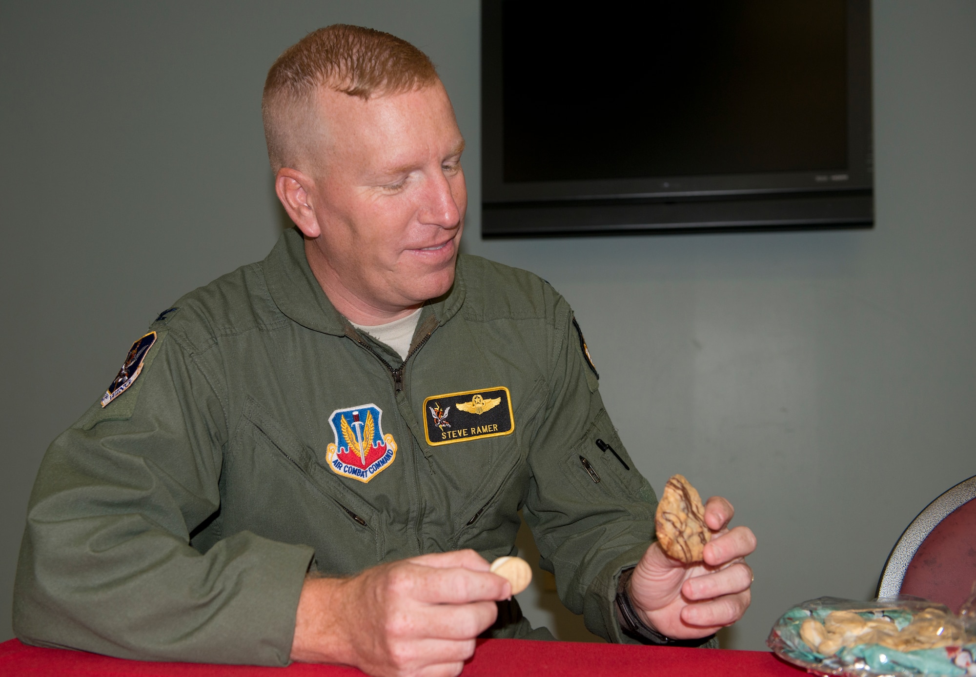 U.S. Air Force Col. Steven Ramer, 23d Wing vice commander, judges the Colossal Cookie competition at Moody Air Force Base, Ga., Dec. 3, 2012. Ramer broke the tie and named the winner. (U.S. Air Force photo by Airman 1st Class Paul Francis/Released)
