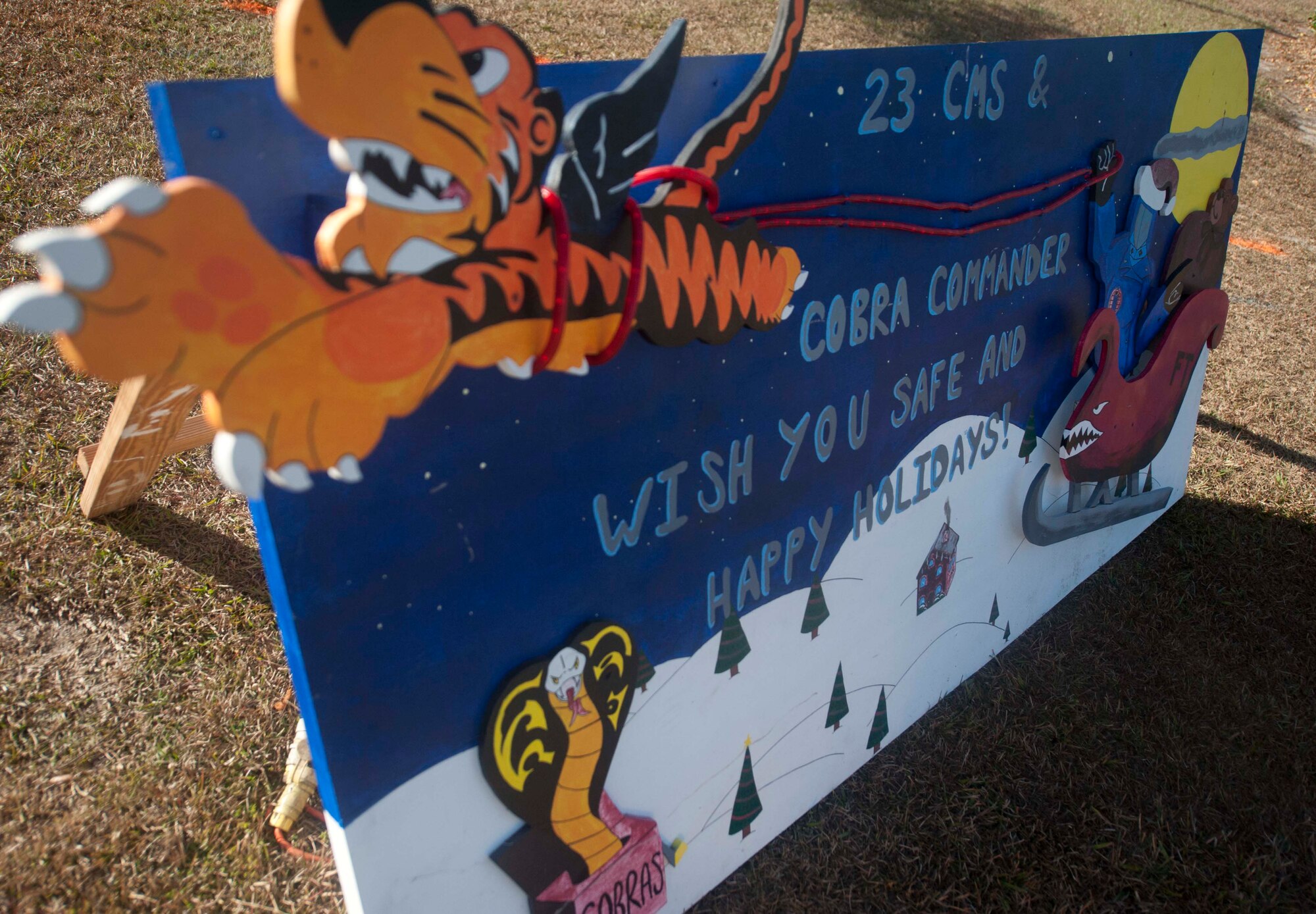 The 23d Component Maintenance Squadron holiday Christmas card sits outside of the 23d Medical Group at Moody Air Force Base, Ga., Dec 5, 2012. Nearly 20 units made and decorated cards for display. (U.S. Air Force photo by Airman 1st Class Paul Francis/Released)
