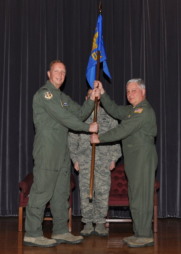 NIAGARA FALLS AIR RESERVE STATION, N.Y. — Col. James F. DiFrancesco (right) accepts command of the 914th Operations Group from Col. Allan L. Swartzmiller, 914th Airlift Wing commander, in an assumption of command ceremony here, December 1, 2012.  Col. DiFrancesco takes command at a base where he previously had been stationed earlier in his military career. He returns to Niagara after serving the past four years as the 514th Operations Group commander, Joint Base McGuire-Dix-Lakehurst, NJ.  (U.S. Air Force photo by Staff Sgt. Stephanie Clark)