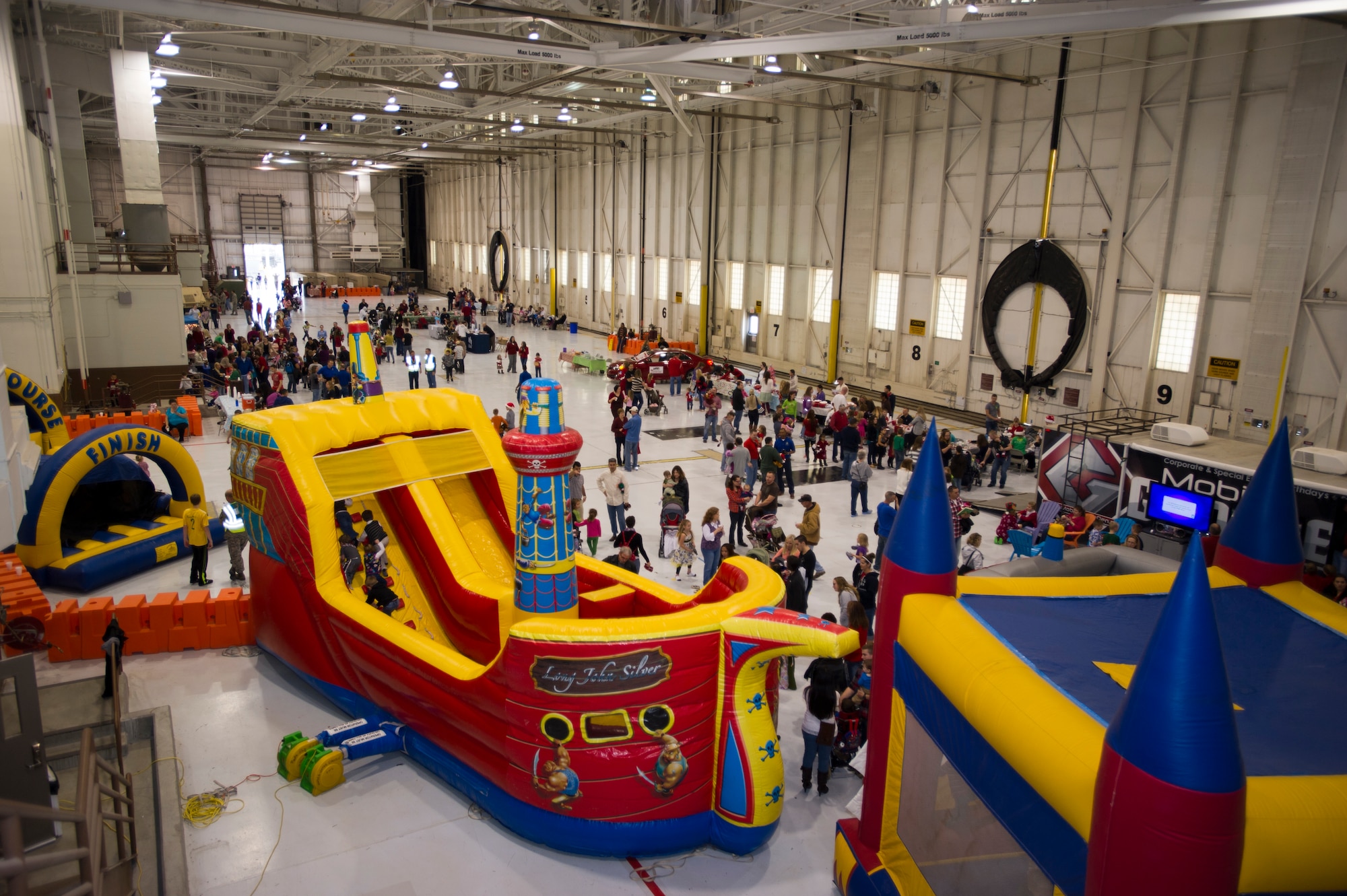 Team McConnell families participate in the annual Children's Holiday Party Dec. 1, 2012, McConnell Air Force Base, Kan. During the event, children were able to experience a variety of activates ranging from building graham cracker trains to visiting with Santa Claus. (U.S. Air Force photo/ Senior Airman Armando A. Schwier-Morales)