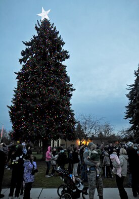 Members of Fairchild gather to see the base Christmas tree lighting in front of the chapel at Fairchild Air Force Base, Wash., Dec. 3, 2012. This Fairchild tradition marks the start of the holiday season. (U.S. Air Force photo by Airman 1st Class Taylor Curry)