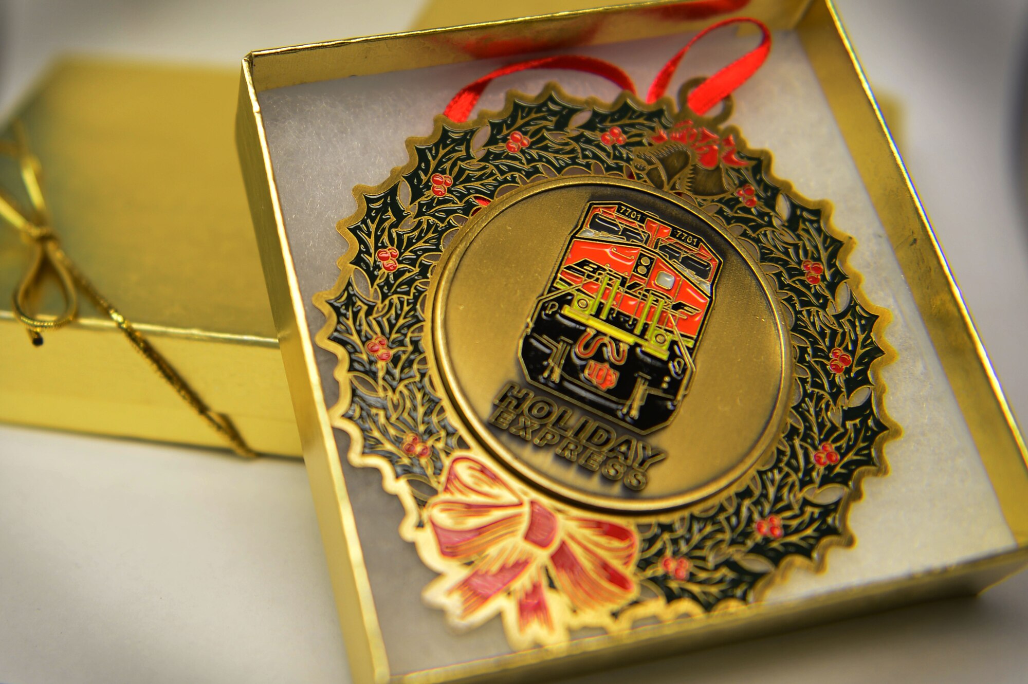 Each family recieved a holiday ornament upon their departure from the Holiday Express in Clovis, N.M., Dec. 3, 2012. The BNSF Holiday Express train expects to provide rides to more than 3,000 members of military families during its 13-day trip through Texas, Oklahoma, New Mexico, and Arizona. (U.S. Air Force photo/Airman 1st Class Eboni Reece)