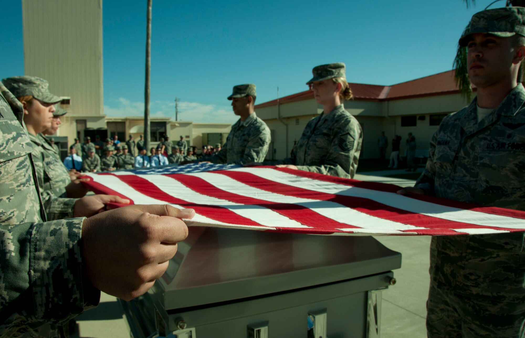MACDILL AIR FORCE BASE, Fla. – The newest members of the military’s elite honor guard perform a mock funeral detail during their graduation ceremony here December 5, 2012.  The eight-day course taught the students how to correctly perform all the roles an honor guard plays, to include funeral details.  Six members of the 927th Air Refueling Wing, the reserve unit here, graduated from the course today and are now qualified to perform in official military ceremonies.  (Official U.S. Air Force photo by Staff Sgt. Shawn Rhodes)