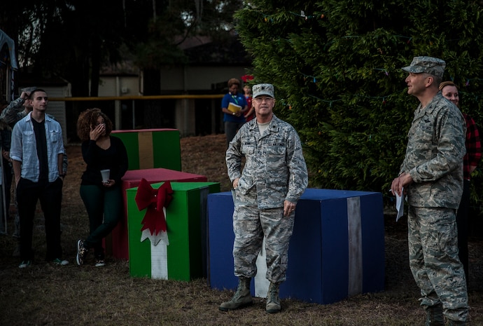 Col. Darren Hartford, 437th Airlift Wing commander, gives his remarks at the 2012 Joint Base Charleston – Air Base Tree Lighting ceremony Dec. 5, 2012. Shortly after his remarks, Hartford had Madison, age 4, and daughter of Lt. Col. Craig Burton, 628th Air Base Wing judge advocate, light the tree. (U.S. Air Force photo/ Senior Airman Dennis Sloan)