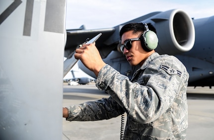 Airman 1st Class Justin Locsin, 437th Aircraft Maintenance Squadron crew chief, starts up an external power source for a C-17 Globemaster III Dec. 5, 2012, at Joint Base Charleston - Air Base, S.C. After flight, maintenance crew chiefs ensure the aircraft remains operationally ready. (U.S. Air Force photo/Staff Sgt. Rasheen Douglas)  