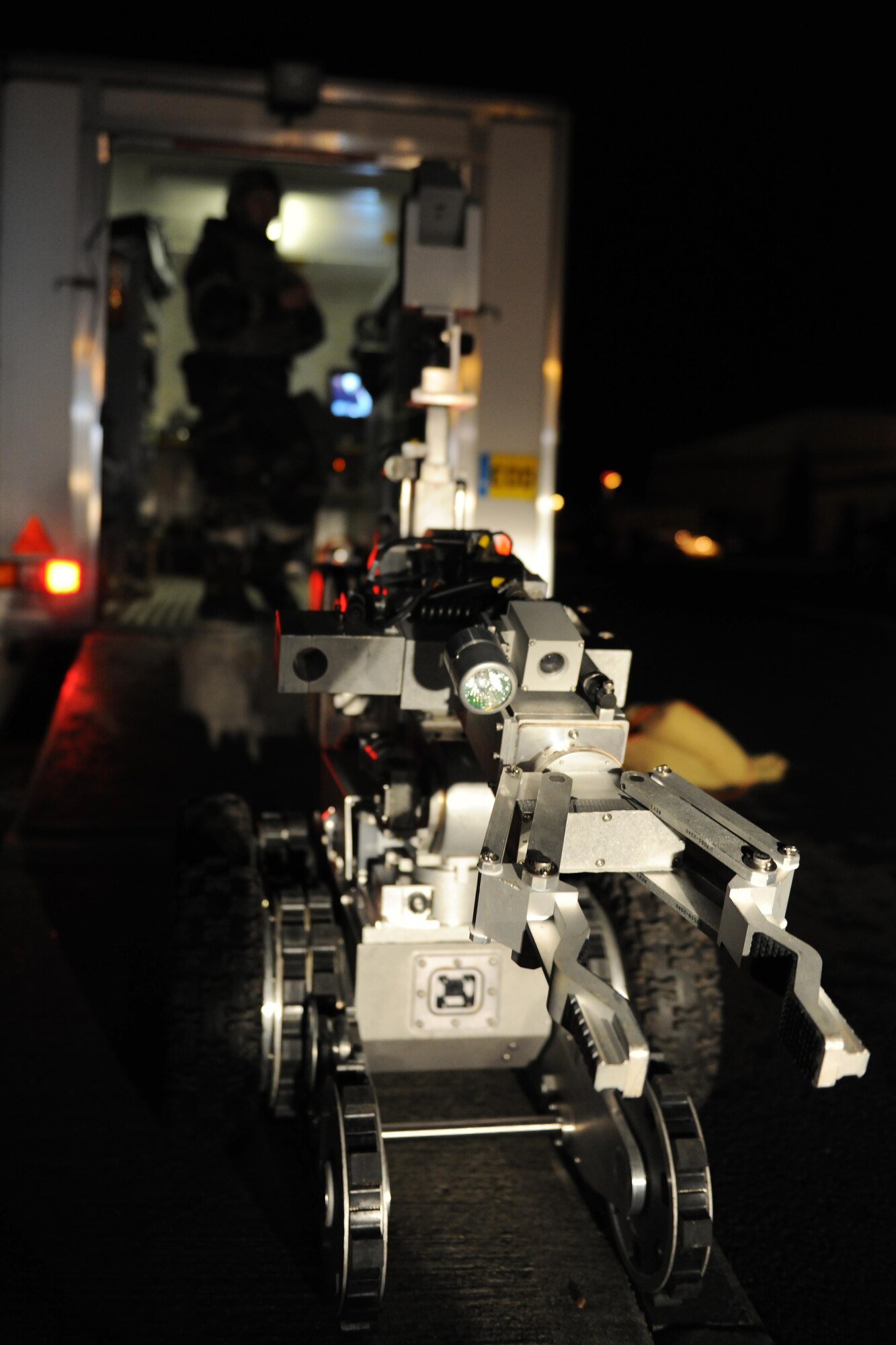 ROYAL AIR FORCE LAKENHEATH, England -- An F6 Alpha robotic platform is remotely guided by  the 48th Civil Engineer Squadron Explosive Ordinance Disposal team to examine an unattended package during a Phase II Exercise Dec. 5, 2012. The week-long exercise tested combat sortie capabilities of the 48th Fighter Wing to support a NATO contingency operation. (U.S. Air Force photo by Senior Airman Lausanne Morgan)