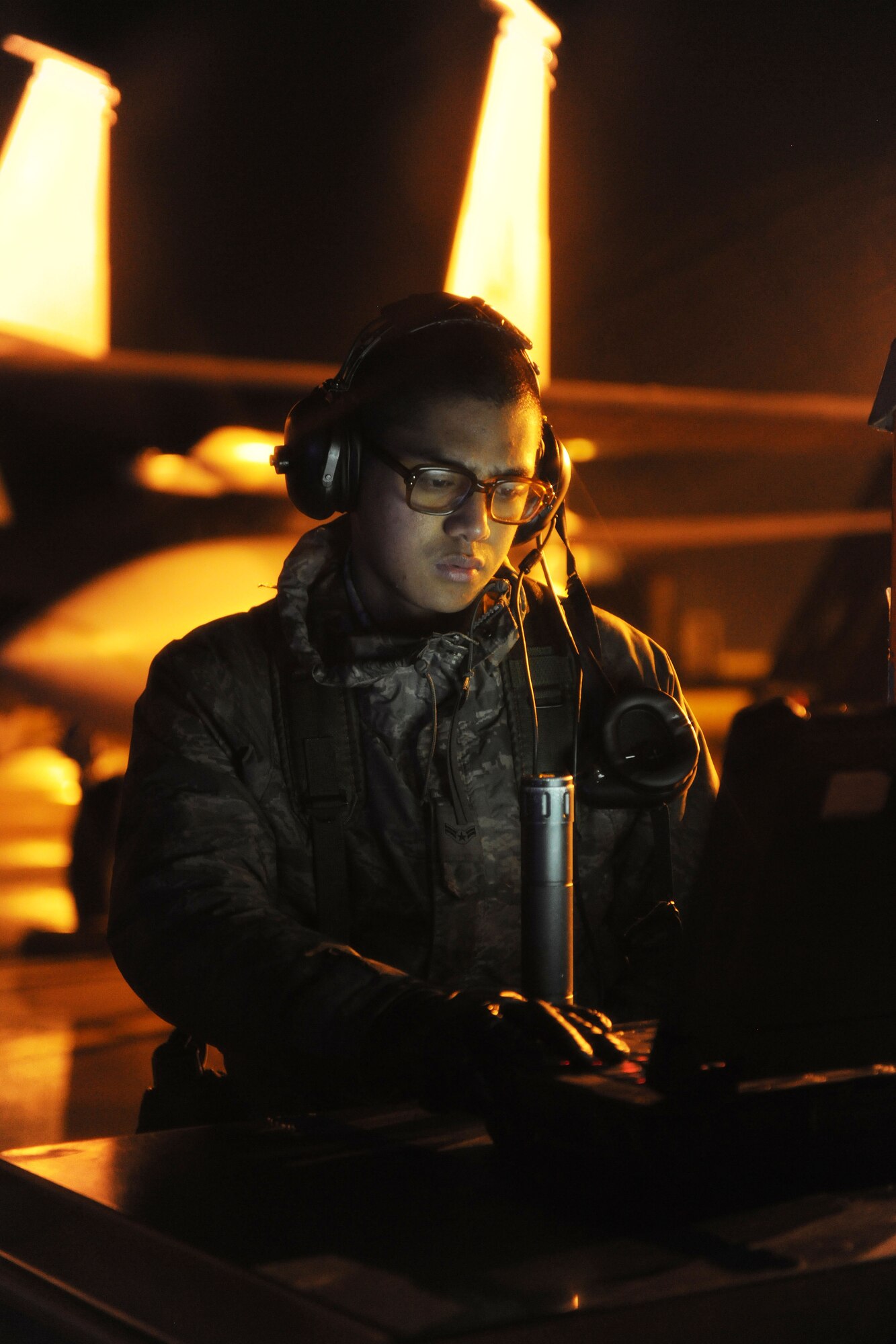 ROYAL AIR FORCE LAKENHEATH, England -- Airman 1st Class Heyward Francisco, 48th Aircraft Maintenance Squadron crew chief, performs preflight checks on an F-15E Strike Eagle during a Phase II Exercise Dec. 4, 2012. The week-long exercise tested combat sortie capabilities of the 48th Fighter Wing to support a NATO contingency operation. (U.S. Air Force photo by Senior Airman Lausanne Morgan)