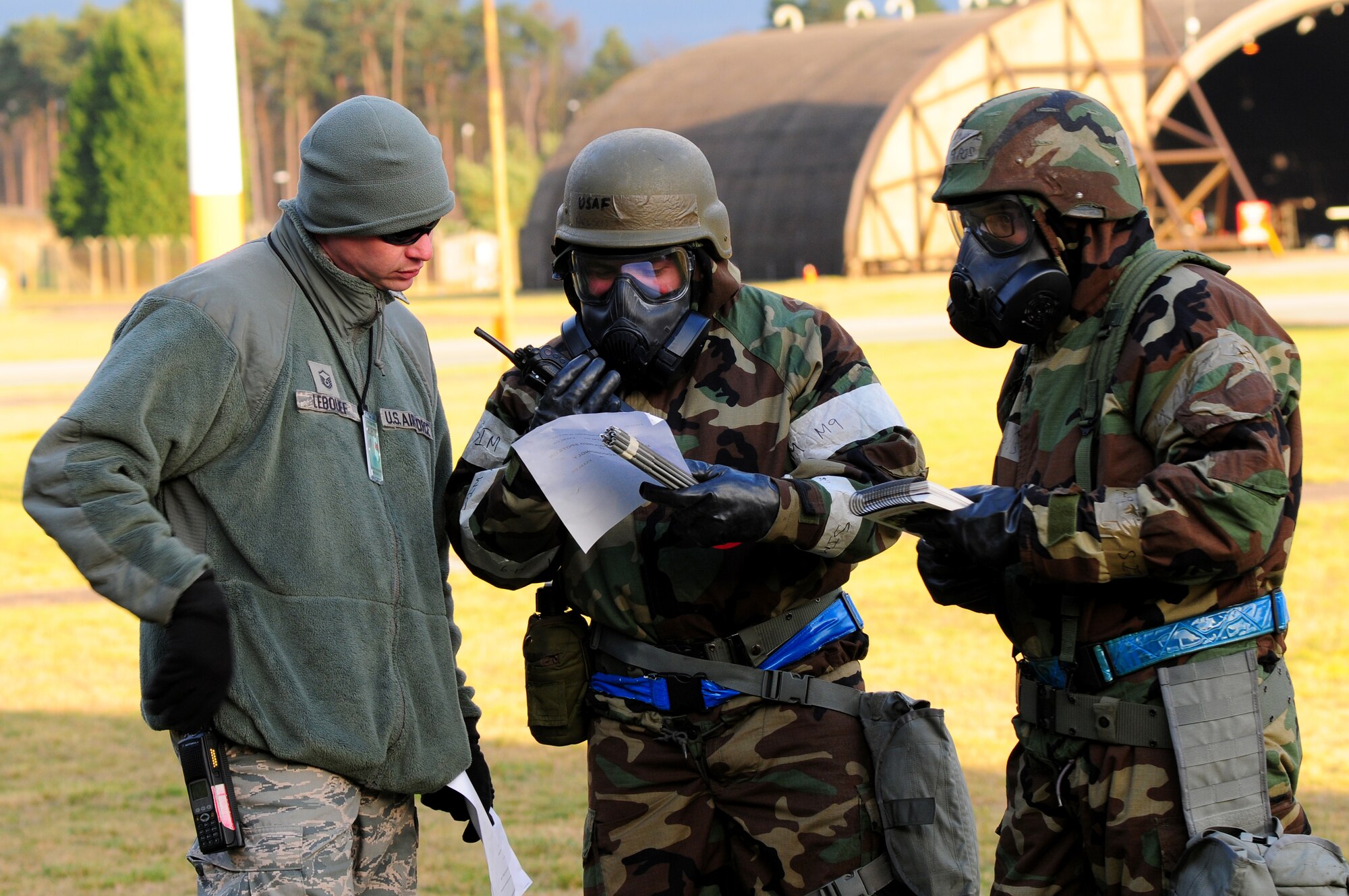 ROYAL AIR FORCE LAKENHEATH, England – Master Sgt. Samuel Lebouef (from left), 48th Fighter Wing exercise evaluation team member, looks over Airman 1st Class Nelson Barajas, 48th Aircraft Maintenance Squadron avionics systems, and Senior Airman Theodore Merrill’s, 48th AMXS crew chief apprentice,  post attack reconnaissance report during a Phase II Exercise Dec. 5, 2012. The week-long exercise tested 48th FW readiness to support NATO contingency operations. (U.S. Air Force photo by Airman 1st Class Cory D. Payne)