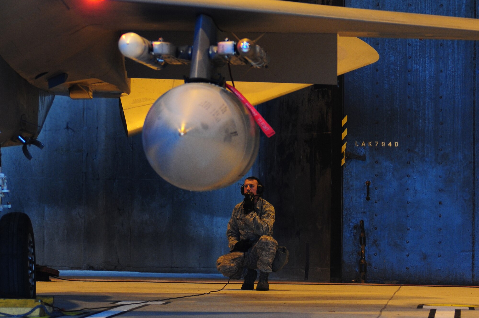 ROYAL AIR FORCE LAKENHEATH, England – Senior Airman Russel Mullins, 493rd Aircraft Maintenance Unit dedicated crew chief, performs pre-flight checks on an F-15C Eagle during a Phase II Exercise Dec. 5, 2012. The week-long exercise tested 48th Fighter Wing readiness to support NATO contingency operations. (U.S. Air Force photo by Airman 1st Class Cory D. Payne)