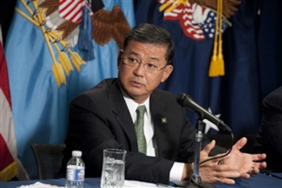 Secretary of Veterans Affairs Eric Shinseki answers a reporter's question during a joint press conference with Secretary of Defense Leon E. Panetta at the Department of Veterans Affairs building in Washington, D.C., on Dec. 6, 2012.  Shinseki and Panetta met prior to the press conference to discuss ways to help facilitate veteran disability claims as well as the new transition assistance programs.  