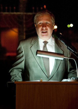 Howard Beckerman, a local community Jewish liaison to Nellis, talks about the history of Hanukkah and the significance of the menorah during the annual Tree and Menorah Lighting ceremony Dec. 7, 2012, at Nellis Air Force Base, Nev. The menorah symbolizes the Jewish people's right to practice their religion freely, paralleling the founding principles of the United States.  (U.S. Air Force photo by Master Sgt. Jason W. Edwards)