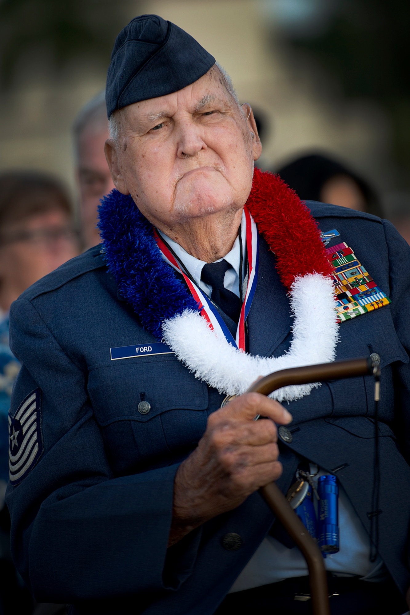 Master Sgt. (Ret.) Ken Ford, a Hickam Field survivor of the Dec. 7, 1941, attacks, awaits the beginning of the ceremony that marks the 71st year since the Japanese attacked the base. The remembrance ceremony hailed and commemorated the actions of the service members and civilians that responded to the attacks, many giving their lives in the line of fire for their country. Hickam Filed lost 189 Airmen and civilians while more than 300 were wounded. Ford, 87, served in WWII, Korea War and Vietnam during his 26-year military career. (U.S. Air Force photo/Staff Sgt. Mike Meares)