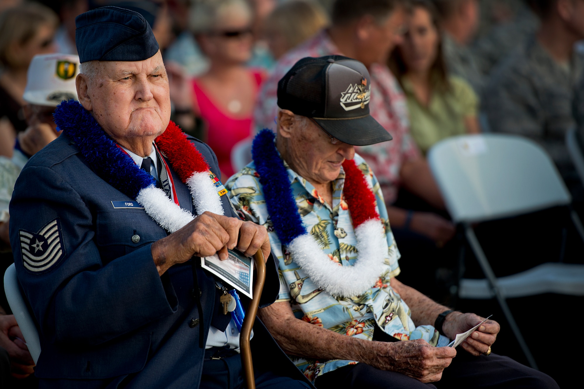 Master Sgt. (Ret.) Ken Ford and Col. (Ret.) Andrew Kowalski, both Hickam Field survivors of the Dec. 7, 1941, attacks, awaits the beginning of the ceremony that marks the 71st year since the Japanese attacked the base. The remembrance ceremony hailed and commemorated the actions of the service members and civilians that responded to the attacks, many giving their lives in the line of fire for their country. Hickam Filed lost 189 Airmen and civilians while more than 300 were wounded. Ford, 87, served in WWII, Korea War and Vietnam during his 26-year military career. Kowalski, 98, served in every rank in the Air Force up to colonel, except buck sergeant. (U.S. Air Force photo/Staff Sgt. Mike Meares)