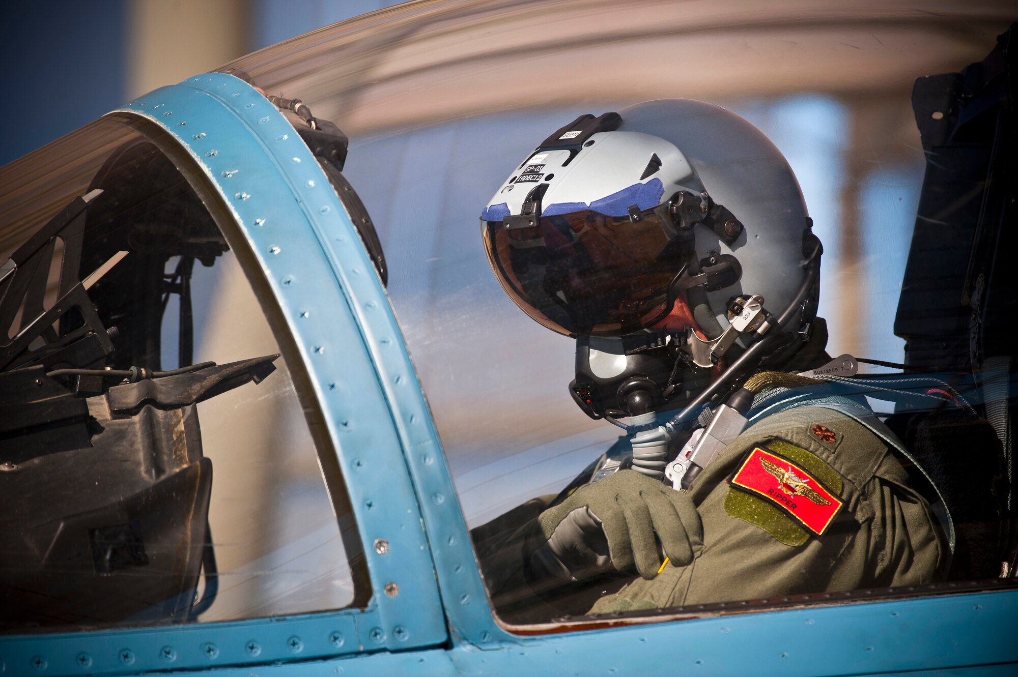 U.S. Air Force Maj. David Anderson, 65th Aggressors Squadron director of operations, conducts pre-flight checks during the Mission Employment Phase exercise Dec. 7, 2012, at Nellis Air Force Base, Nev. The exercise is hosted north of Las Vegas on the Nevada Test and Training Range and incorporates Air Force capabilities in diverse scenarios which can include aircraft in conjunction with space and cyberspace assets. (U.S. Air Force photo/Senior Airman Brett Clashman)