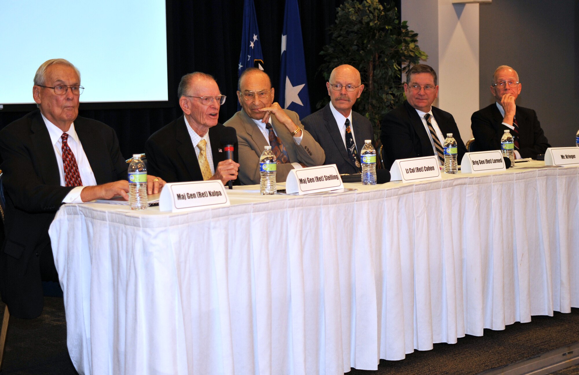 Members of the Secretary of the Air Force Office of Special Projects Alumni Association participate in a legacy panel here, Dec. 3.  The SAFSP Legacy Panel provides a medium through which senior experts from SAFSP, NRO, and other organizations share their knowledge. In the past, the panel has focused on topics such as the recently declassified Corona program. This year, the panel focused on the SAFSP organization.  (Photo by Sarah Corrice)