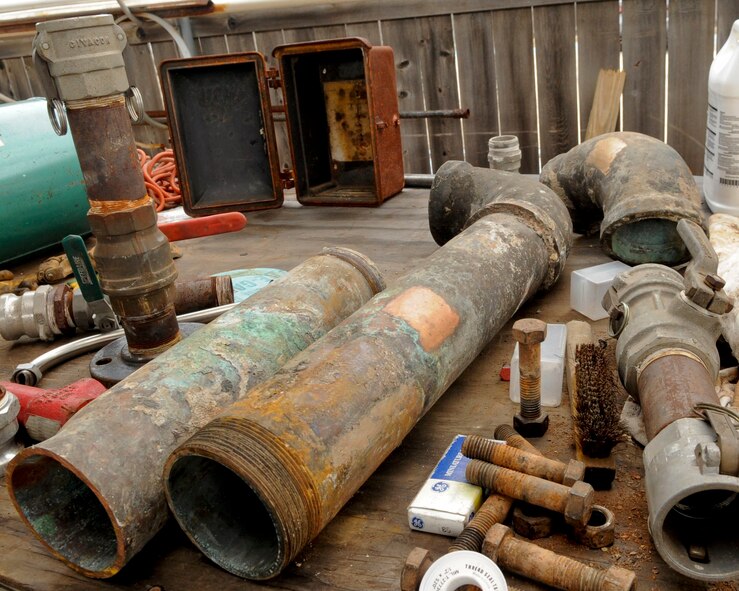 Four-inch copper piping is placed in a storage area behind the 2nd Civil Engineer Squadron?s liquid fuels section on Barksdale Air Force Base, La., Dec. 3. Craftsmen from the liquid fuels section replaced 3,000 feet of the 1950s copper piping with 12-inch carbon steel on the flightline. All of the copper is being stored until it is salvaged for later use. (U.S. Air Force photo/Senior Airman Kristin High) 