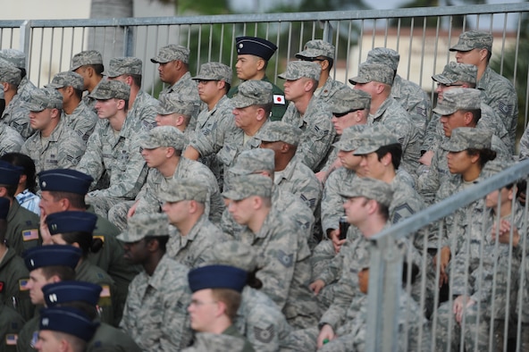 Military servicemembers sit in attendance during a remembrance ceremony at Joint Base Pearl Harbor-Hickam, Hawaii, for Hickam survivors of the Dec. 7, 1941 attacks on Oahu by Japanese forces. Seventy-one years ago, Japanese air and naval forces launched a surprise attack on U.S. military forces throughout Oahu. The attacks hit several installations on the island with the aim of crippling the U.S. fleet to prevent it's interference with Japanese military plans in the Pacific theater. (U.S. Air Force photo by Staff Sgt. Nathan Allen)
