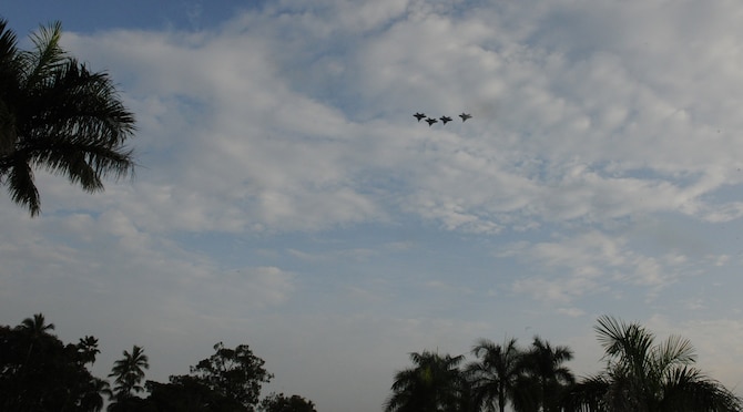 F-22 Raptors from the 199th and 19th Fighter Squadrons from Joint Base Pearl Harbor-Hickam, Hawaii, perform a "fly-over" during a remembrance ceremony for Hickam survivors of the Dec. 7, 1941 attacks on Oahu by Japanese forces. Seventy-one years ago, Japanese air and naval forces launched a surprise attack on U.S. military forces throughout Oahu. The attacks hit several installations on the island with the aim of crippling the U.S. fleet to prevent it's interference with Japanese military plans in the Pacific theater. (U.S. Air Force photo by Staff Sgt. Nathan Allen) 

