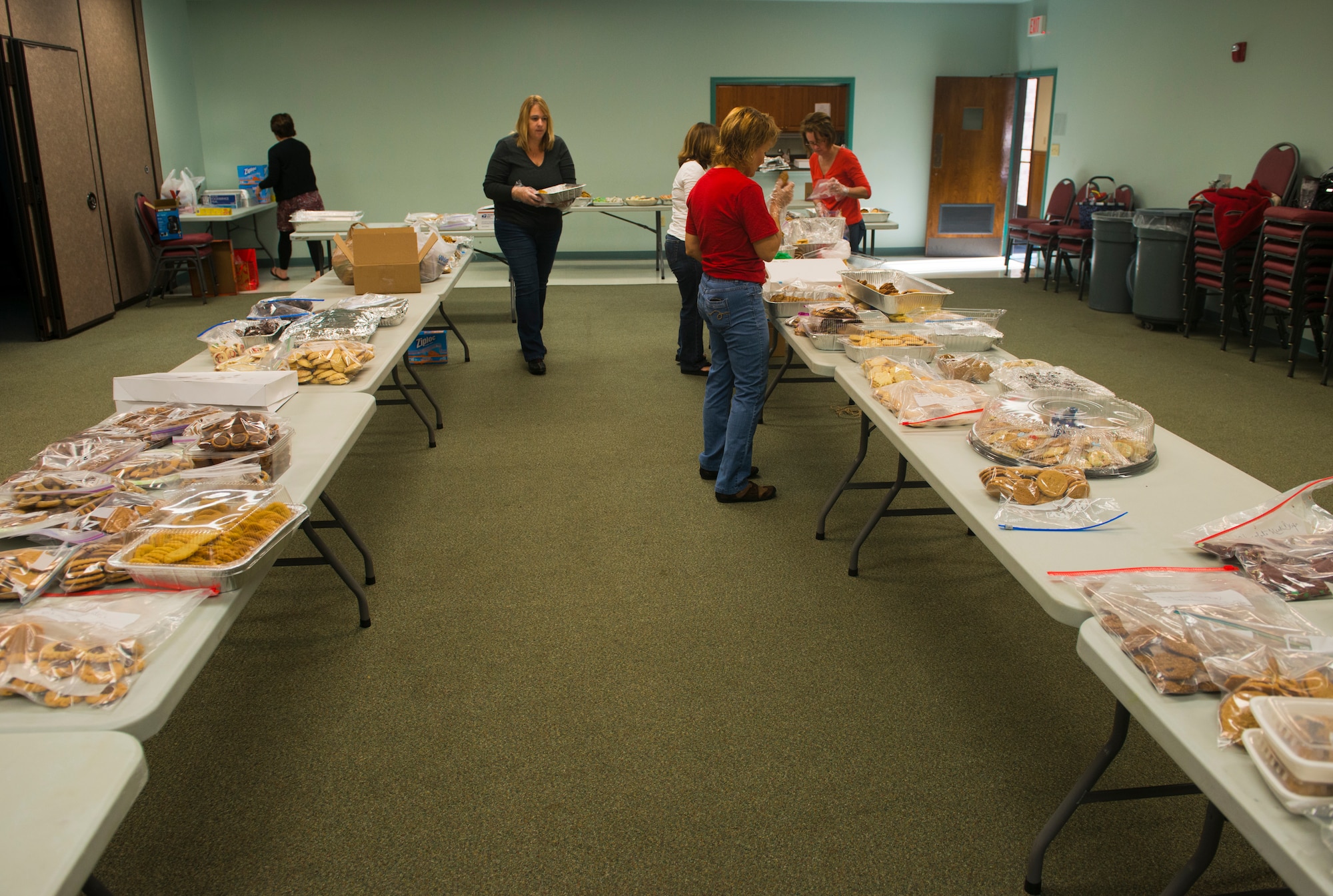 Cookies are bagged and separated in preparation for the Annual Moody Airmen Cookie Drive at Moody Air Force Base, Ga., Dec. 3, 2012. Approximately 12,000 cookies were expected to be donated during the cookie drive. (U.S. Air Force photo by Senior Airman Douglas Ellis/Released)  

