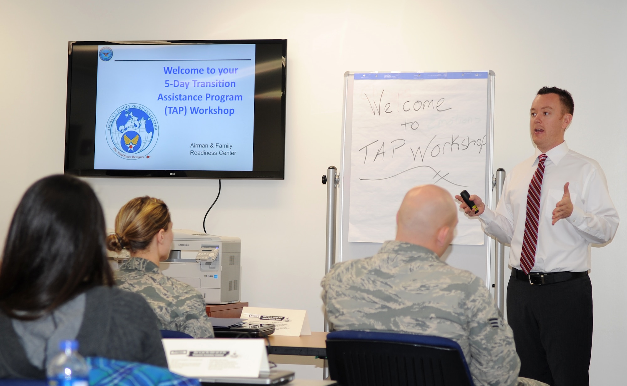 Jason L. Gunnarson, Airman & Family Readiness Center transition assistance program manager, briefs Airmen during the 5-day Transition Assistance Program (TAP) workshop at Seymour Johnson Air Force Base, N.C., Dec. 3, 2012. The TAP program is designed to inform military members transitioning to the civilian life about the services and entitlements offered to them. (U.S. Air Force photo/Airman 1st Class Gino Reyes/Released)