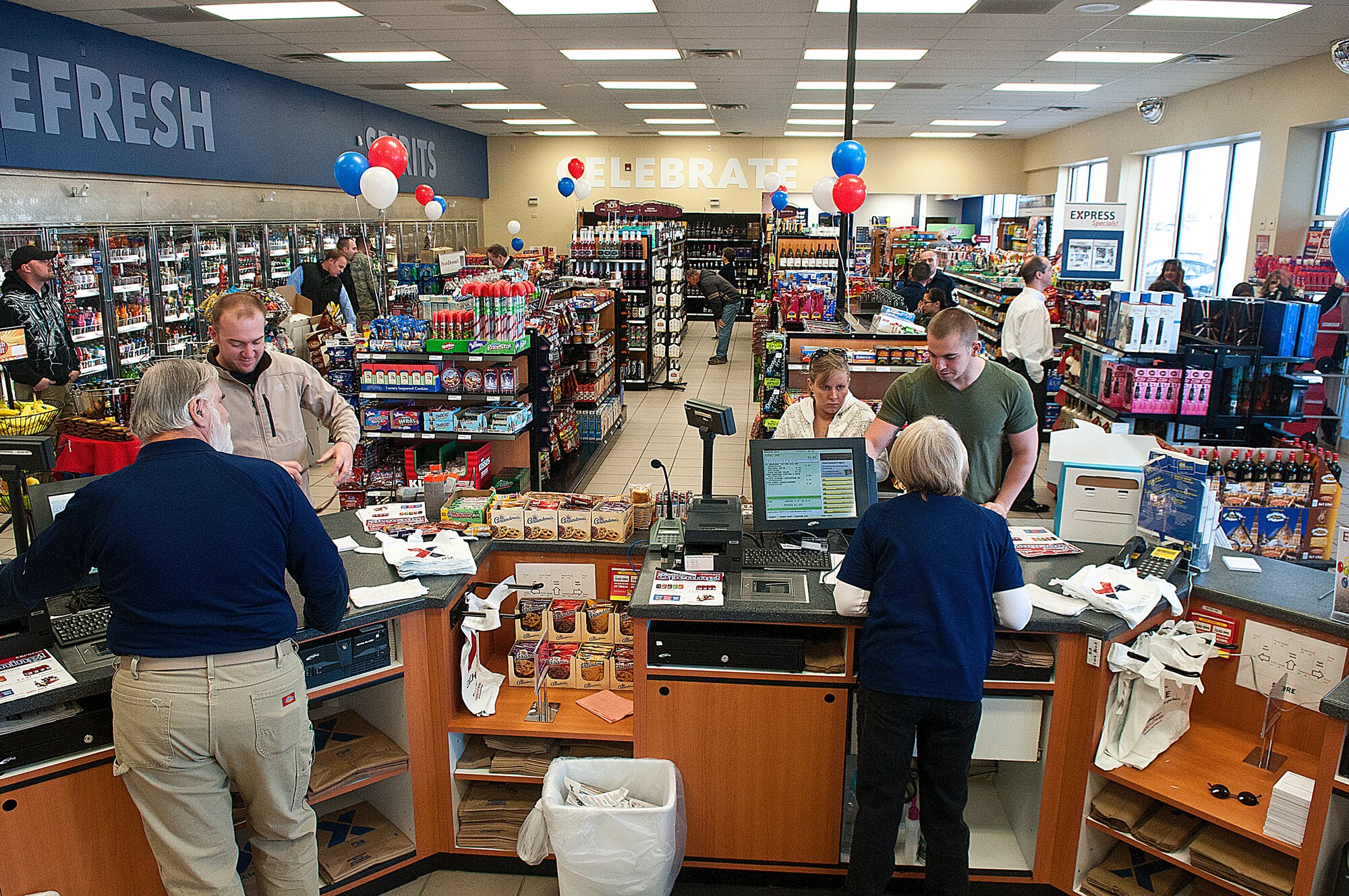 Customers browse the selection of products at the Express, formerly known as the Shoppette, after it’s grand opening ceremony Dec. 3. A ribbon-cutting ceremony was performed by senior base leadership including Col. Christopher Coffelt,, 90th Missile Wing commander, and Col. Timothy Dodge, 90th Mission Support Group commander. (U.S. Air Force photo by R.J. Oriez)