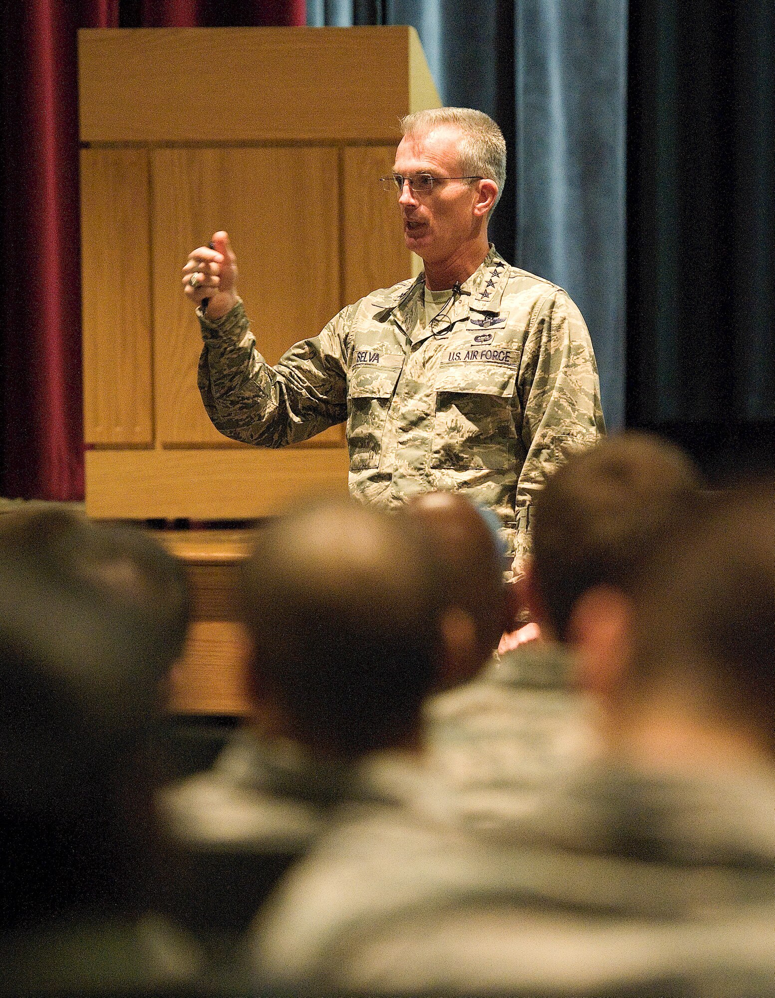 Gen. Paul J. Selva, commander of Air Mobility Command, Scott Air Force Base, Ill., talks with airmen of the 436th Airlift Wing, at Dover Air Force Base, Del., Dec. 6, 2012. Selva visited the base to introduce himself to Team Dover at an All Call during a world-wind tour of AMC Wings throughout December. As commander of AMC, Selva leads all mobility air forces comprised of nearly 134,000 personnel from the active duty, Air National Guard , and Air Force Reserve. (U.S. Air Force photo by Greg L. Davis)