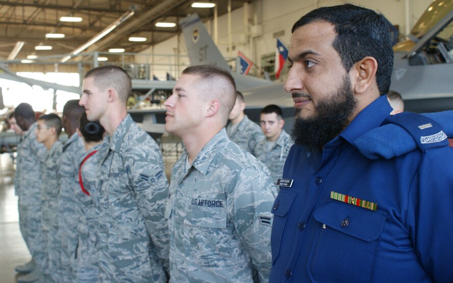 Royal Saudi Air Force (RSAF) Chief Master Sgt. Muftah Alessa (far right) falls into formation during the 364th Training Squadron's Electrical and Environmental apprentice course graduation ceremony at Sheppard Air Force Base, Texas, Dec. 7, 2012.   Alessa became just the second RSAF student to graduate as the "Top Graduate" of the course.  (U.S. Air Force photo/Dan Hawkins) 