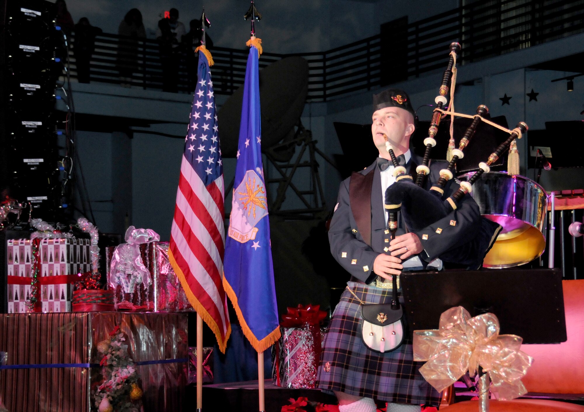 Senior Airman Adam Tianello, Pipe Major of the Band of the U.S. Air Force Reserve, plays a medley of traditional songs during the 51st Annual Holiday Concert at the Museum of Aviation at Robins Air Force Base, Ga., Dec. 6. (U.S. Air Force photo/Senior Airman Katie Spencer)
