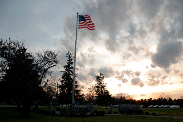 The first few days of December saw warm temperatures fo rthe Dayton area and Wright-Patterson Air Force Base, creating a fine evening for the flag retreat ceremony led by Lt. Col. Greg Cullison and the 88th MDSS.  (photo by Niki Jahns)
