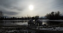 MINOT AIR FORCE BASE, N.D. – Fire Fighters from the 5th Civil Engineering Squadron add another layer of water to one of the new ice skating rinks here, Nov. 28. There will be three ice skating rink located on base. (U.S. Air Force photo/Senior Airman Brittany Y. Auld)