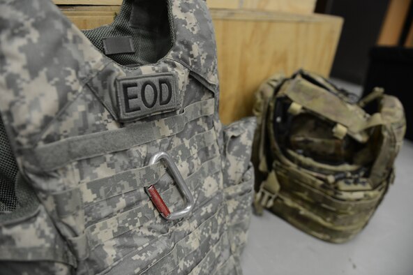 SPANGDAHLEM AIR BASE, Germany – An improved outer tactical vest rests on the floor of the 52nd Civil Engineer Squadron Explosive Ordnance Disposal shop Dec. 4, 2012. Hungarian army members visited Spangdahlem Air Base to join forces in teaching information on the most current threats in contingency operations across the globe. Training with NATO allies on counter improvised-explosive-device operations provides better interoperability in deployed environments through knowledge and understanding of each nation’s capabilities. (U.S. Air Force photo by Airman 1st Class Gustavo Castillo/Released)