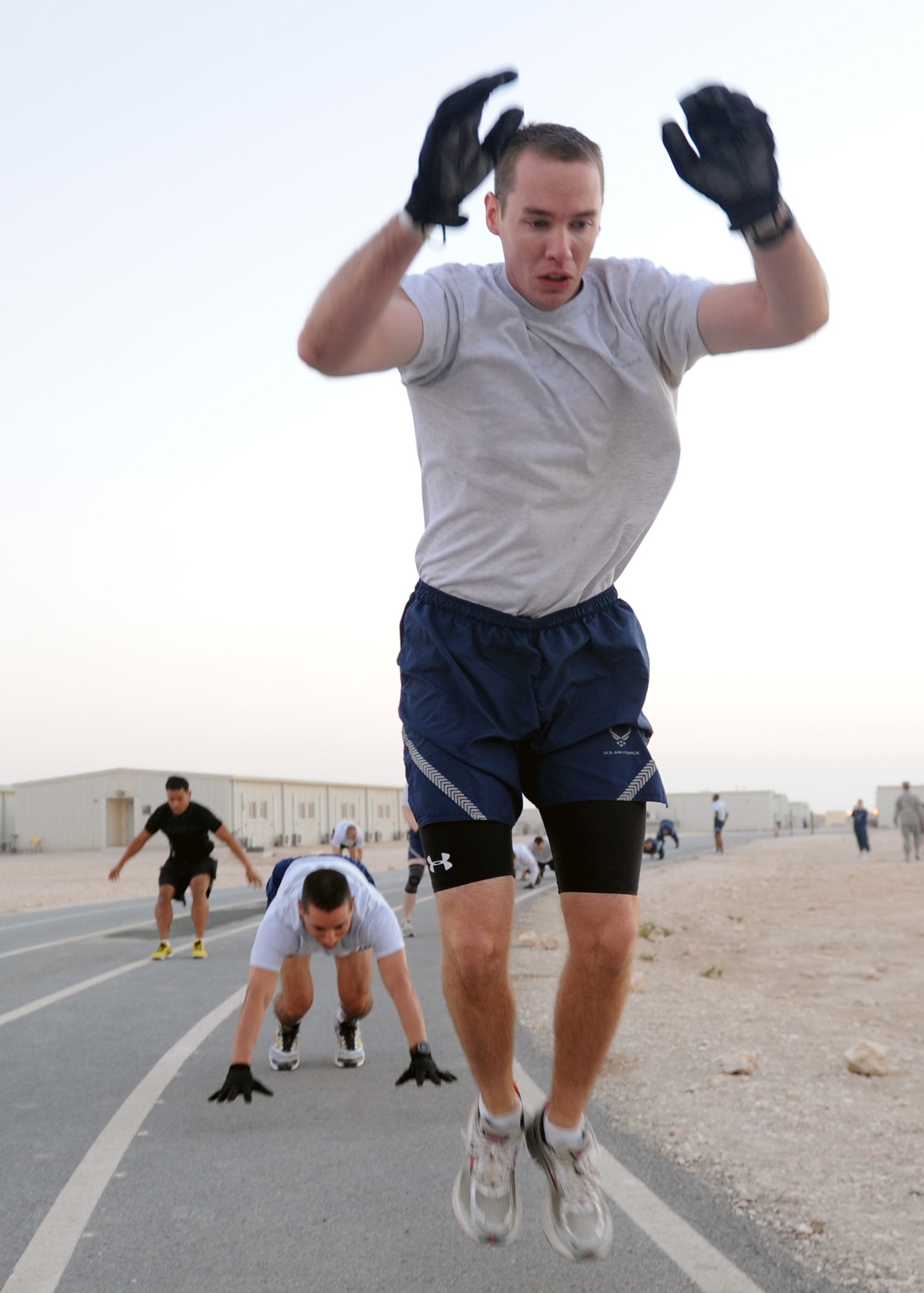SOUTHWEST ASIA – 1st Lt. Matt Jackson, 609th Air Communications Squadron Detachment 1, takes the lead during the extreme burpee challenge Dec. 1. The lieutenant took first place completing a total of one mile of burpees in 1 hour, 32 minutes and 49 seconds. (U.S. Air Force photo/Senior Airman Joel Mease)